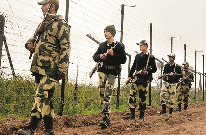 BSF men can be seen patrolling the border
